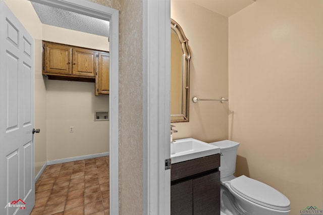 1502 Meandering Way, Longview, TX 75604 - half bath with toilet, vanity, and baseboards