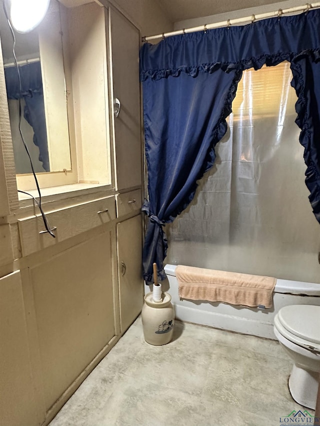 bathroom featuring concrete flooring, toilet, and shower / bathtub combination with curtain