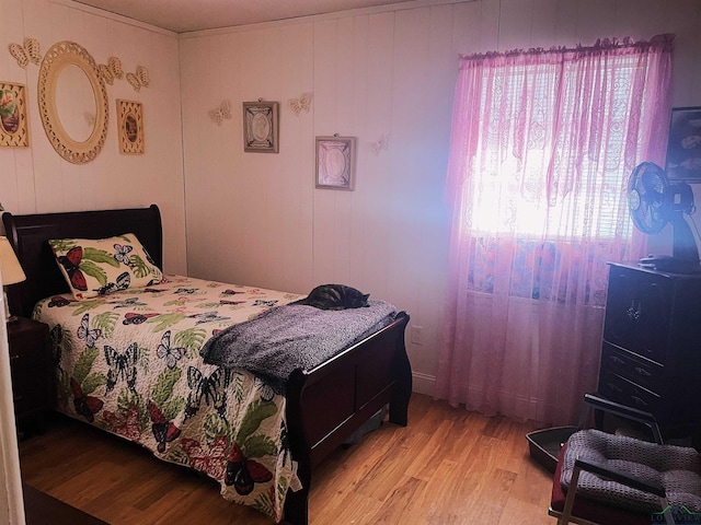 bedroom with light wood-type flooring