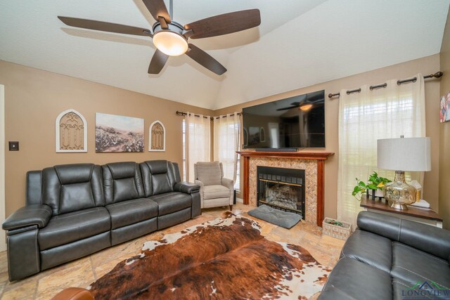 202 Mill Run Dr, Longview, TX 75604 - living area with a ceiling fan, a tile fireplace, and lofted ceiling