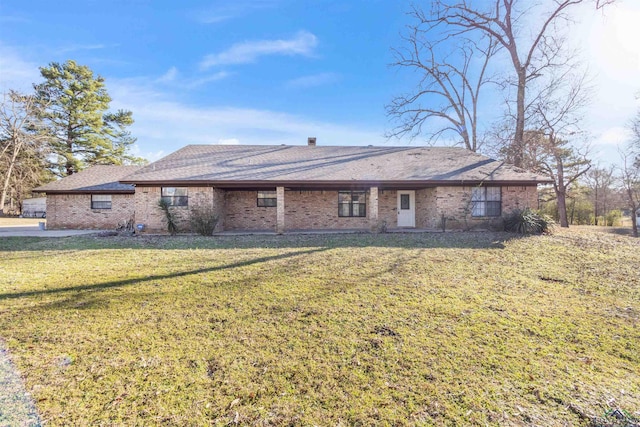 back of house with a yard