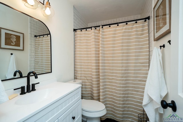 114 Fairview Dr, Longview, TX 75604 - bathroom with vanity and a shower with shower curtain