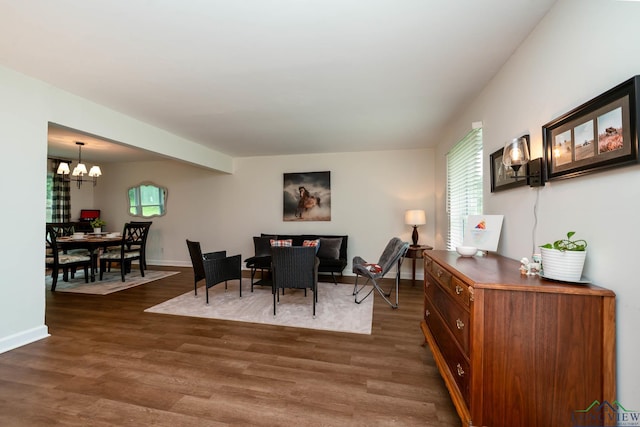 114 Fairview Dr, Longview, TX 75604 - dining area with a chandelier and dark wood-style flooring
