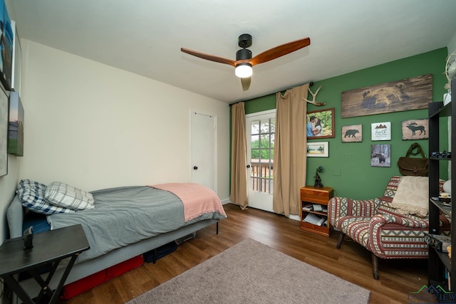 114 Fairview Dr, Longview, TX 75604 - bedroom with wood finished floors, a ceiling fan, and access to exterior