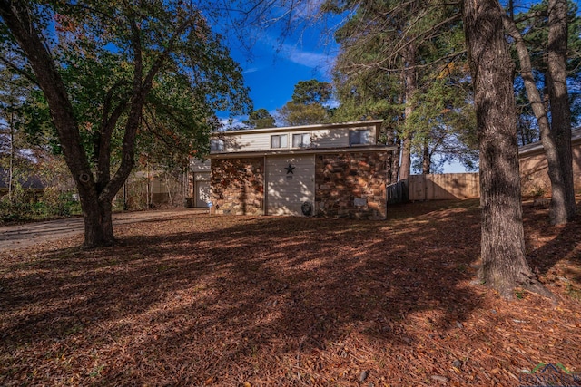 rear view of house with a shed