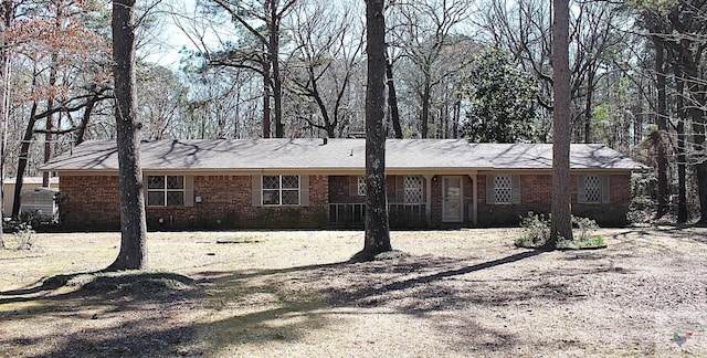 ranch-style house with brick siding