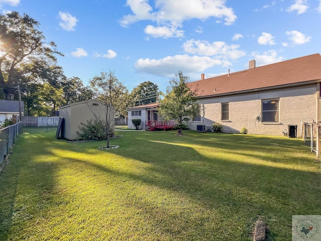 view of yard featuring central AC