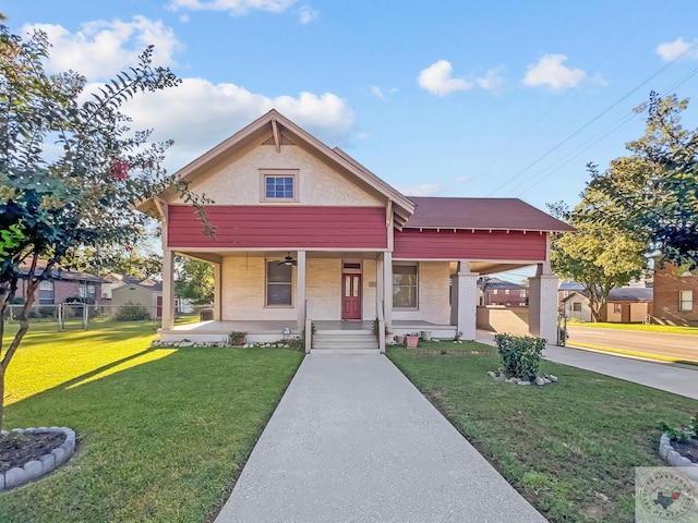 view of front of home with a porch and a front lawn