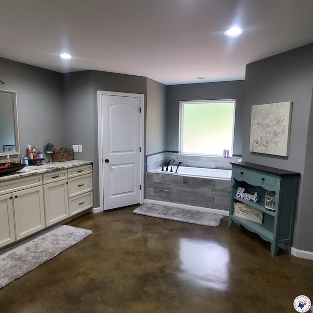 3059 Mc 22, Fouke, AR 71837 - bathroom featuring vanity, a bath, finished concrete flooring, and recessed lighting