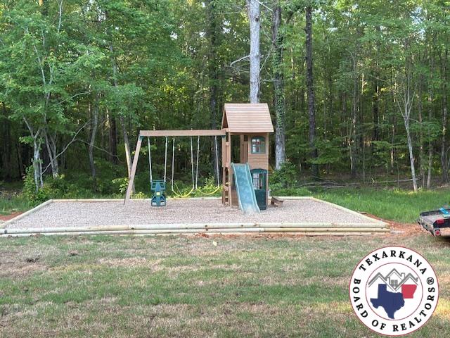 3059 Mc 22, Fouke, AR 71837 - community play area with a lawn