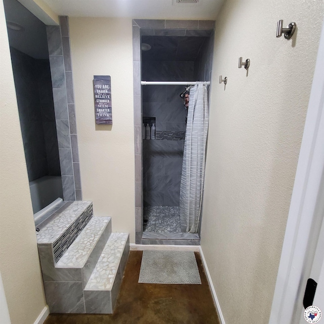 3059 Mc 22, Fouke, AR 71837 - bathroom with tiled shower and concrete flooring