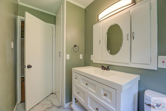 bathroom featuring vanity and ornamental molding