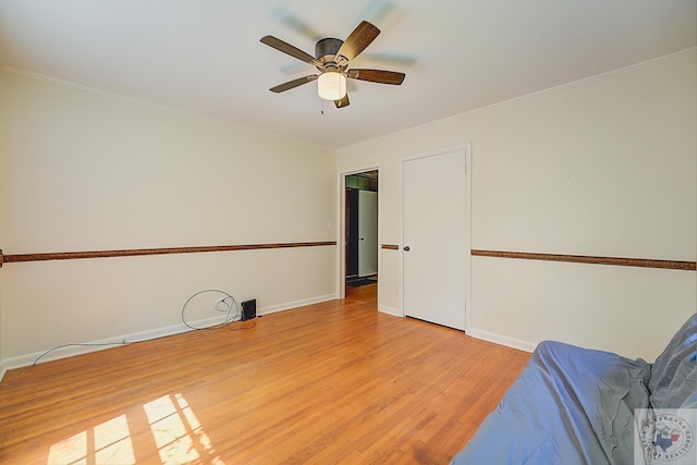 interior space featuring light hardwood / wood-style floors and ceiling fan