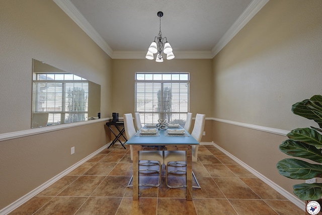 3607 Melody Ln, Texarkana, TX 75503 - tiled dining room with baseboards, an inviting chandelier, and crown molding
