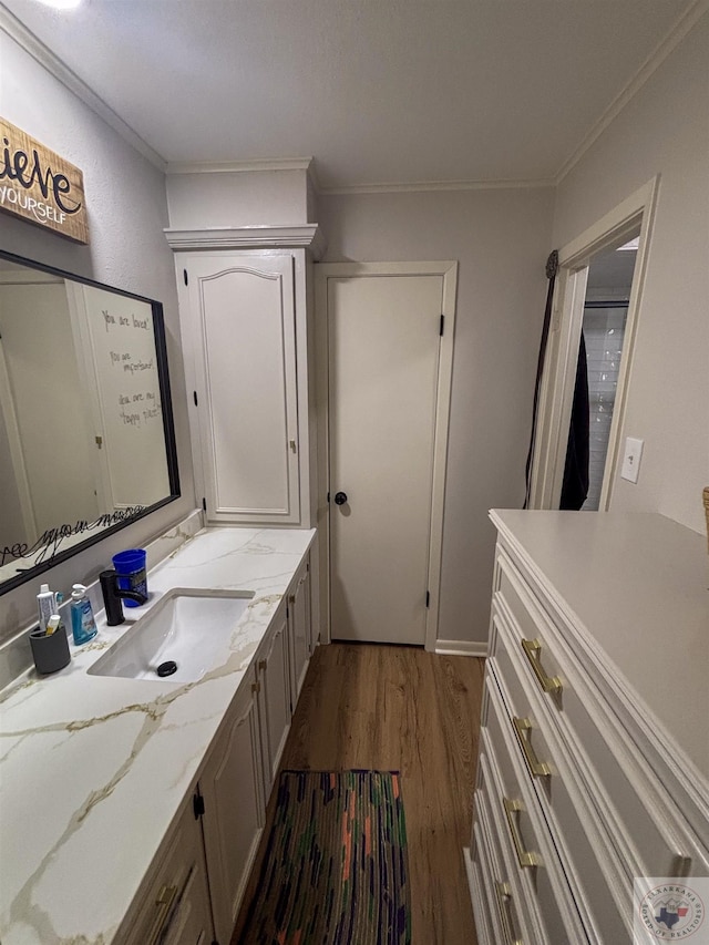 111 Oak St, New Boston, TX 75570 - bathroom with vanity, ornamental molding, and wood finished floors