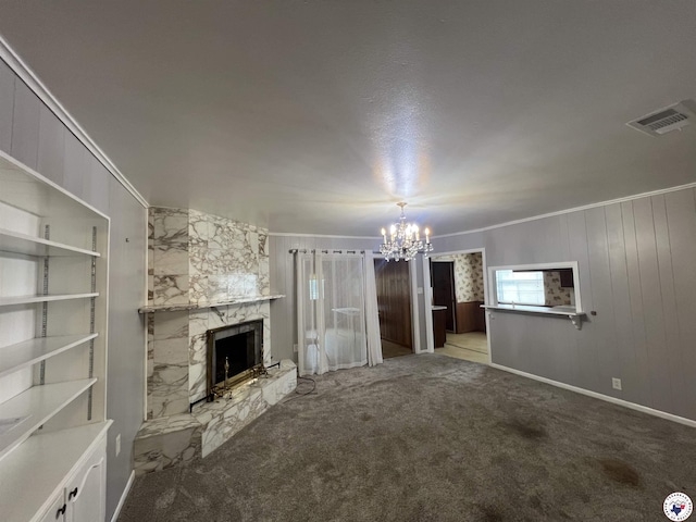 416 W Greenfield Dr, Wake Village, TX 75503 - unfurnished living room with a chandelier, crown molding, a fireplace, and carpet floors