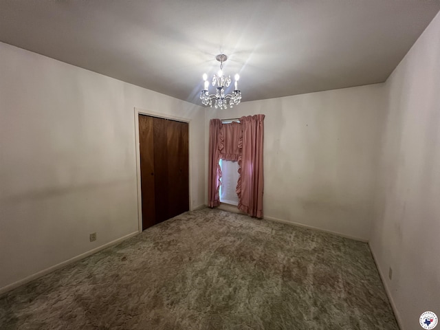 416 W Greenfield Dr, Wake Village, TX 75503 - unfurnished room featuring carpet floors, a chandelier, and baseboards