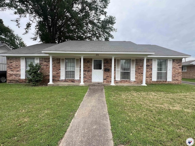 416 W Greenfield Dr, Wake Village, TX 75503 - single story home featuring a front lawn and a porch