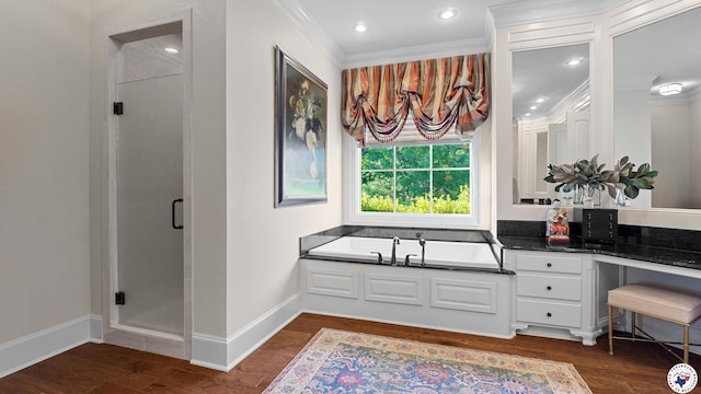 6804 Springwood Cir, Texarkana, TX 75503 - full bathroom featuring a shower stall, crown molding, a bath, wood finished floors, and vanity