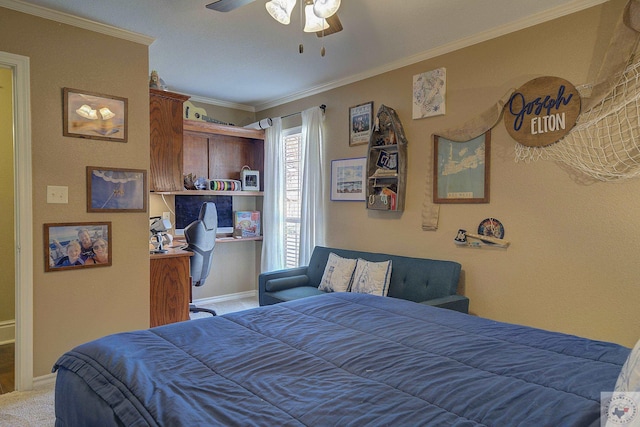 carpeted bedroom with crown molding and ceiling fan