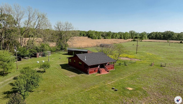 birds eye view of property featuring a rural view