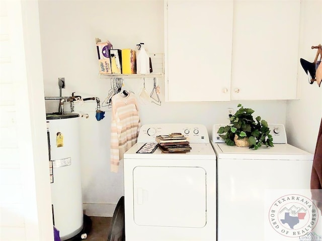 washroom featuring washing machine and dryer and water heater