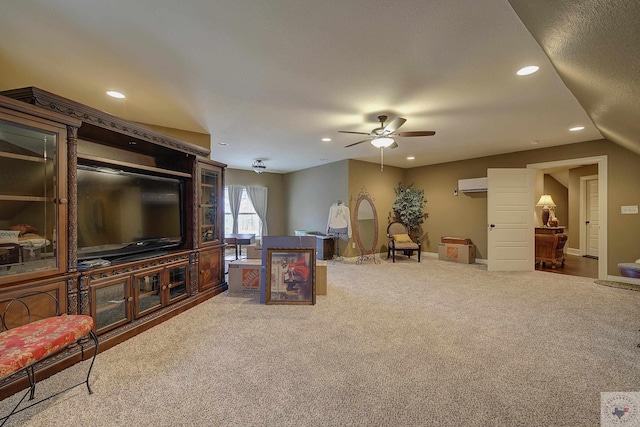 carpeted living room featuring ceiling fan, an AC wall unit, baseboards, and recessed lighting