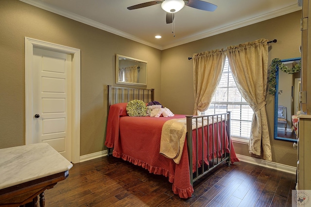 bedroom featuring ceiling fan, ornamental molding, dark wood finished floors, and baseboards