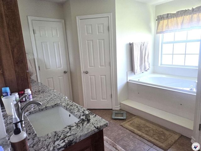 6133 Timberwood Ln, Texarkana, AR 71854 - full bath with double vanity, a garden tub, and tile patterned flooring