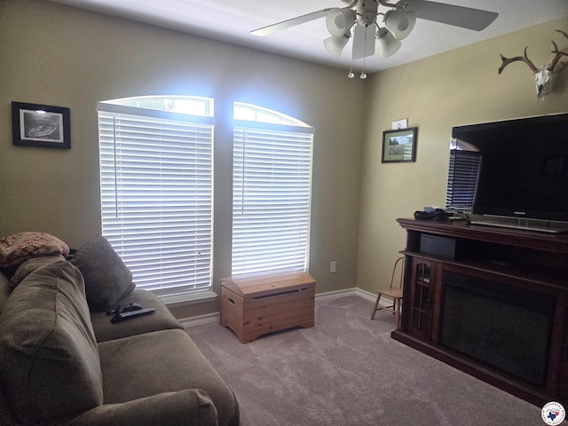 6133 Timberwood Ln, Texarkana, AR 71854 - carpeted living area with ceiling fan and baseboards