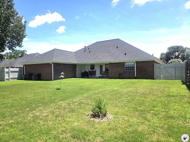 6133 Timberwood Ln, Texarkana, AR 71854 - back of property with brick siding, roof with shingles, a patio area, and a gate