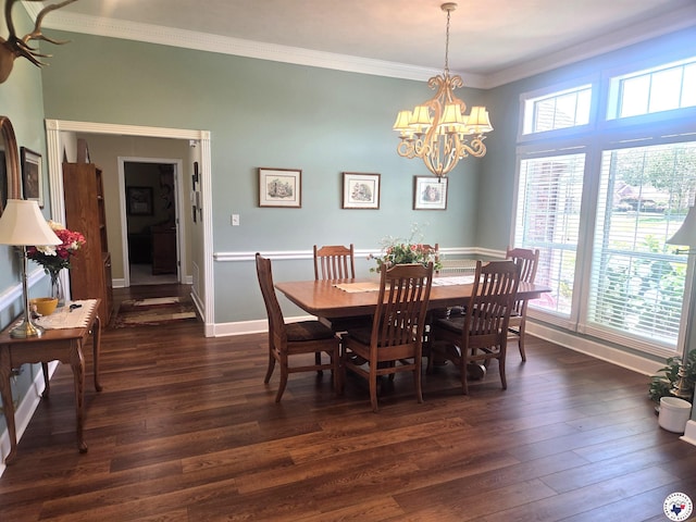 6133 Timberwood Ln, Texarkana, AR 71854 - dining room featuring plenty of natural light, dark wood finished floors, a chandelier, and crown molding
