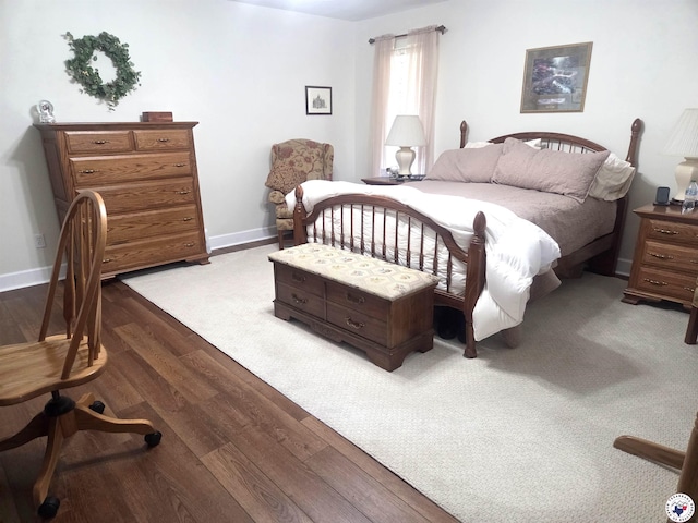 6133 Timberwood Ln, Texarkana, AR 71854 - bedroom with dark wood finished floors and baseboards