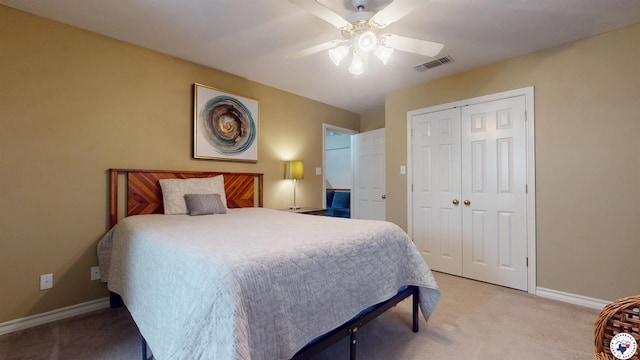 7109 Forest Oak Dr, Texarkana, AR 71854 - bedroom featuring light carpet, a closet, and ceiling fan