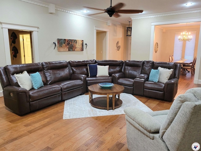30 Hickory Oak Ln, Texarkana, TX 75501 - living area featuring recessed lighting, light wood-style floors, ornamental molding, and ceiling fan with notable chandelier