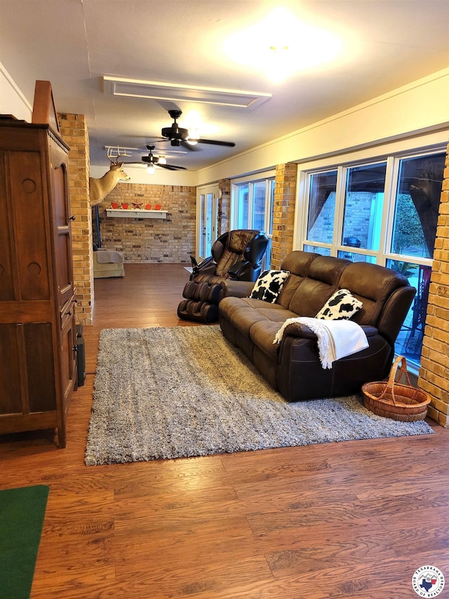 30 Hickory Oak Ln, Texarkana, TX 75501 - living room with brick wall, a ceiling fan, and wood finished floors