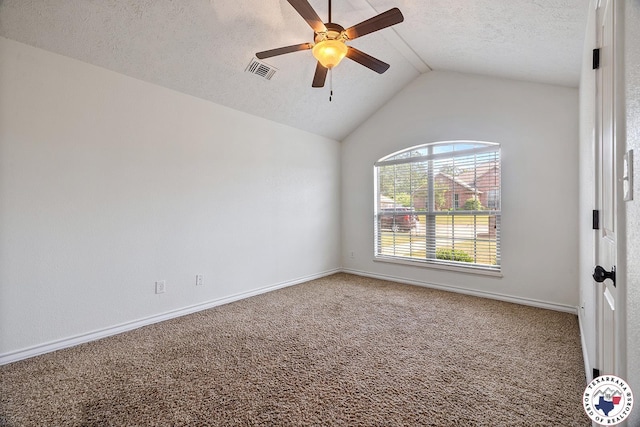 3604 Melody Ln, Texarkana, TX 75503 - empty room featuring a ceiling fan, vaulted ceiling, carpet floors, a textured ceiling, and baseboards