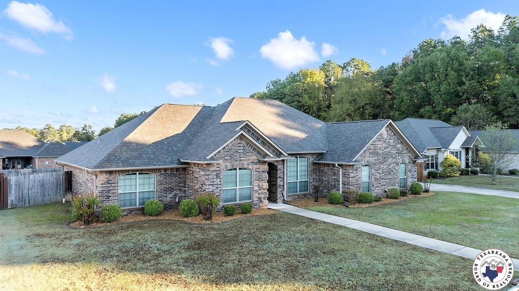 3604 Melody Ln, Texarkana, TX 75503 - view of front of house with brick siding and a shingled roof