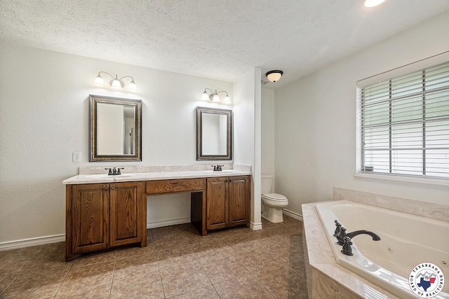3604 Melody Ln, Texarkana, TX 75503 - full bath featuring toilet, a tub with jets, baseboards, double vanity, and tile patterned floors