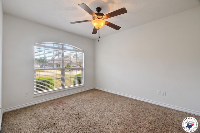 3604 Melody Ln, Texarkana, TX 75503 - unfurnished room featuring carpet floors, baseboards, and ceiling fan