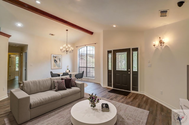 living room with dark hardwood / wood-style floors, lofted ceiling with beams, and a notable chandelier