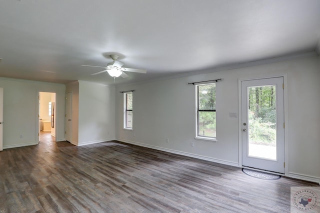 unfurnished room featuring crown molding, dark hardwood / wood-style floors, and ceiling fan