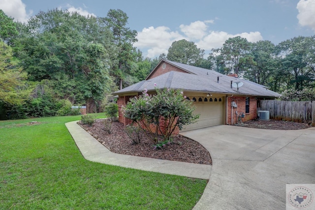 ranch-style house featuring cooling unit, a garage, and a front lawn