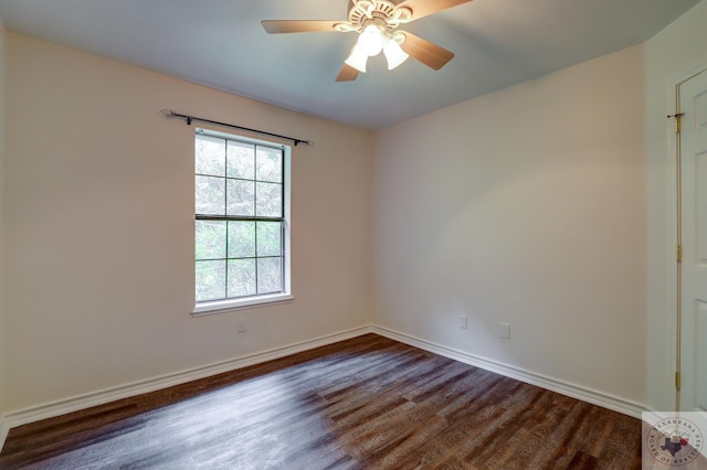 unfurnished room with dark hardwood / wood-style floors and ceiling fan