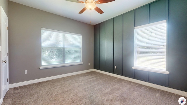 6908 Woodmere Ct, Texarkana, TX 75503 - empty room with carpet and a ceiling fan