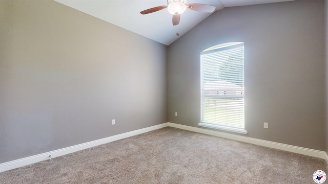 6908 Woodmere Ct, Texarkana, TX 75503 - carpeted empty room with ceiling fan and vaulted ceiling