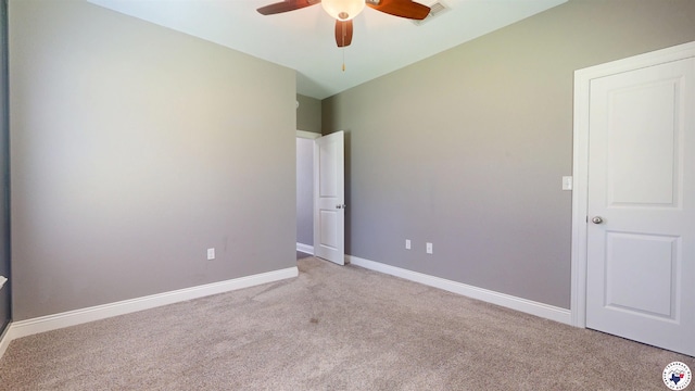 6908 Woodmere Ct, Texarkana, TX 75503 - unfurnished bedroom with carpet floors and ceiling fan