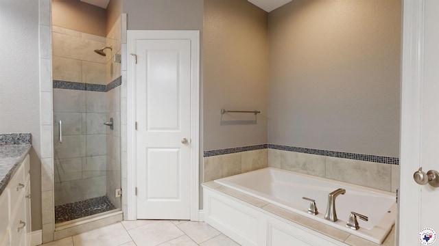 6908 Woodmere Ct, Texarkana, TX 75503 - full bath featuring a bath, a stall shower, tile patterned floors, and vanity