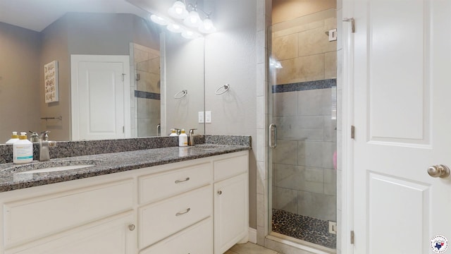 6908 Woodmere Ct, Texarkana, TX 75503 - bathroom featuring a shower stall and double vanity
