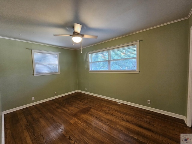 spare room with ceiling fan, ornamental molding, and dark hardwood / wood-style floors